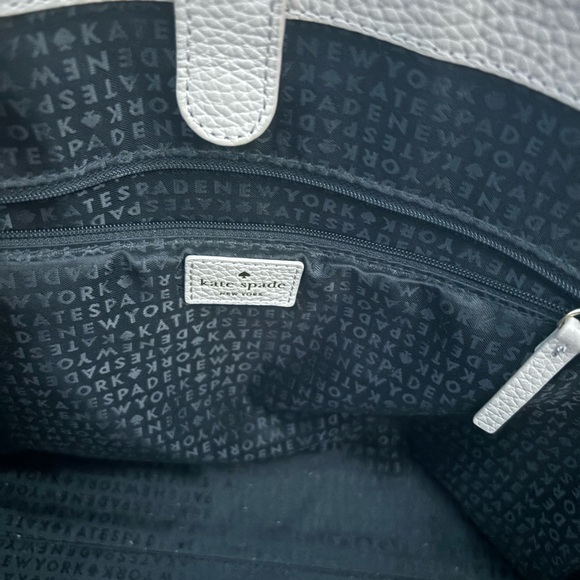 Kate Spade Handbag 👜 Tan exterior, black tassel accent, gold colored hardware. - Picture 5 of 5